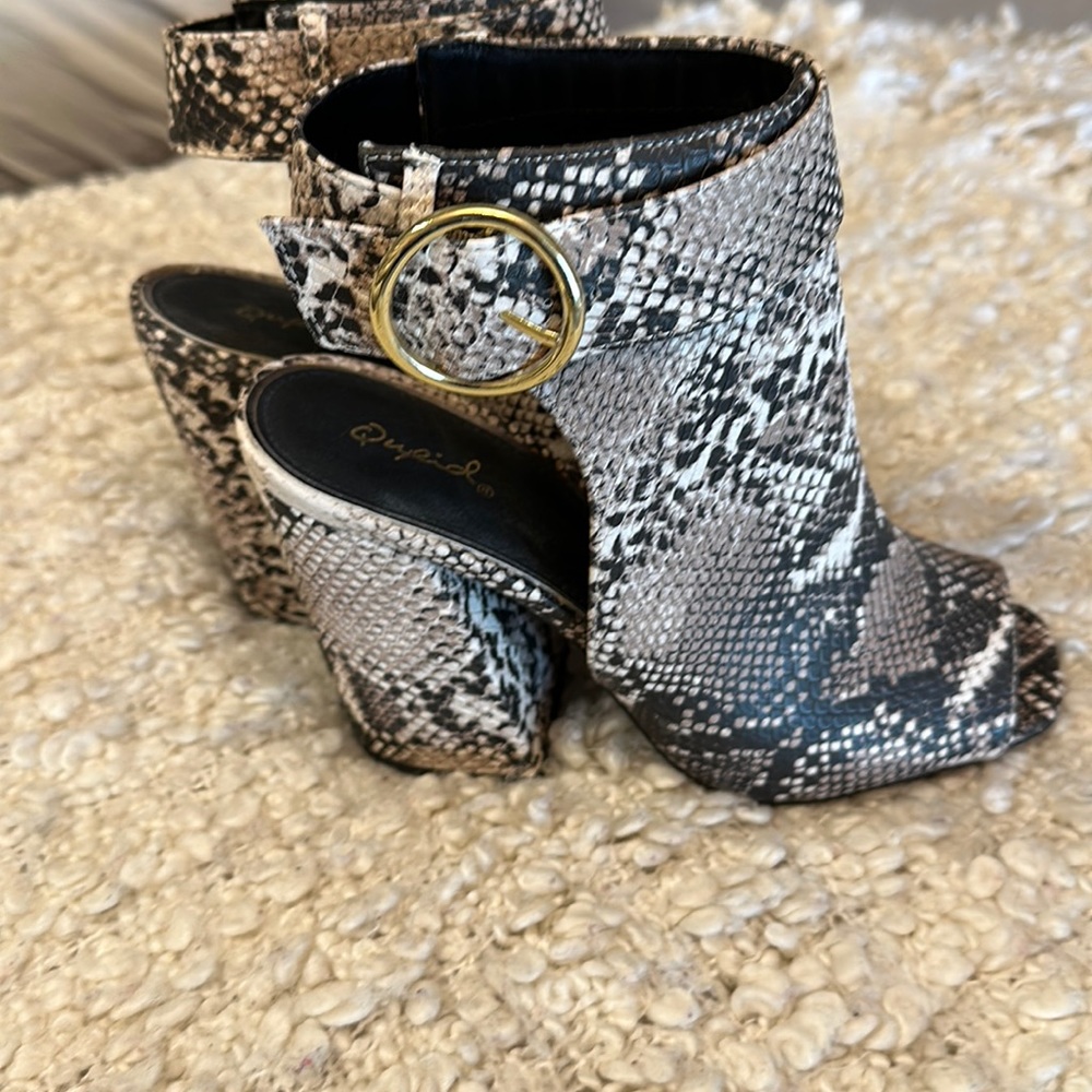 Chunky snakeskin booties